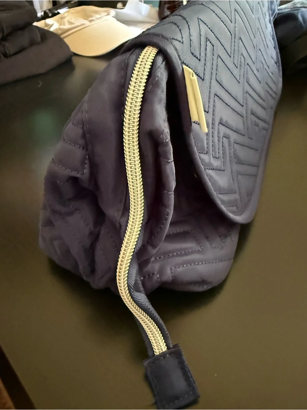 LEUDES navy blue quilted makeup/lingerie/hair tools bag with chevron pattern.EUC